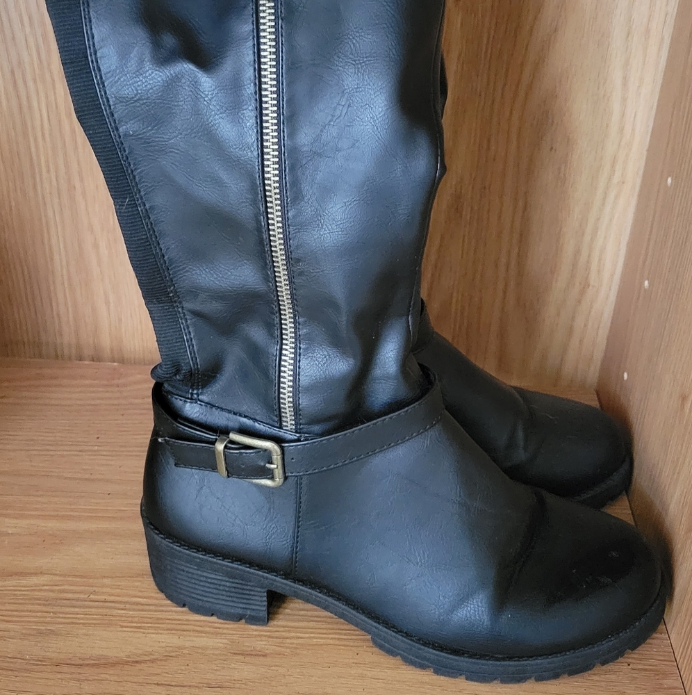 Knee high black leather boots